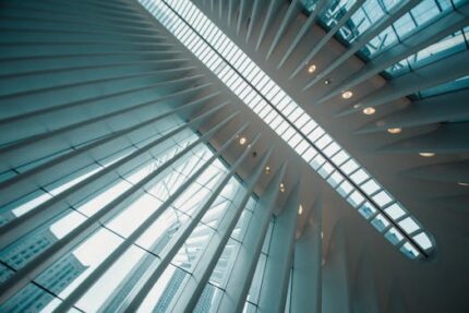 Dynamic perspective of futuristic architecture with skylight, capturing angular modern designs.
